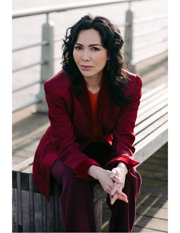 Photo of Wendy Chin-Tanner in a red suit